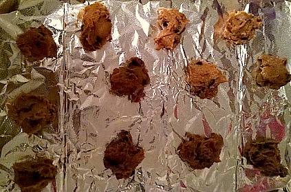 Raw chocolate chip cookie dough on baking sheet