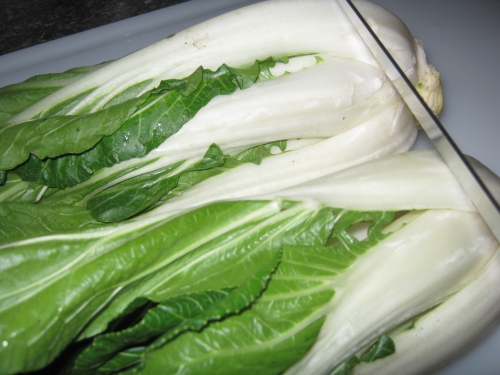 Snipping ends of bok choy